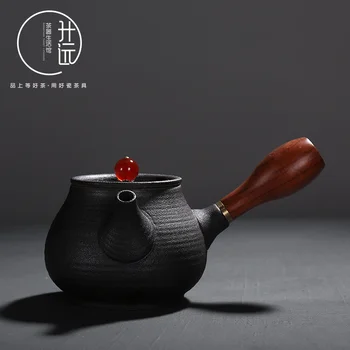 Rough black pottery side ceramic antique Japanese wooden handle teapot manual kungfu tea pot Puer tea maker ceremony
Rough black pottery side ceramic antique Japanese wooden handle teapot manual kungfu tea pot Puer tea maker ceremony