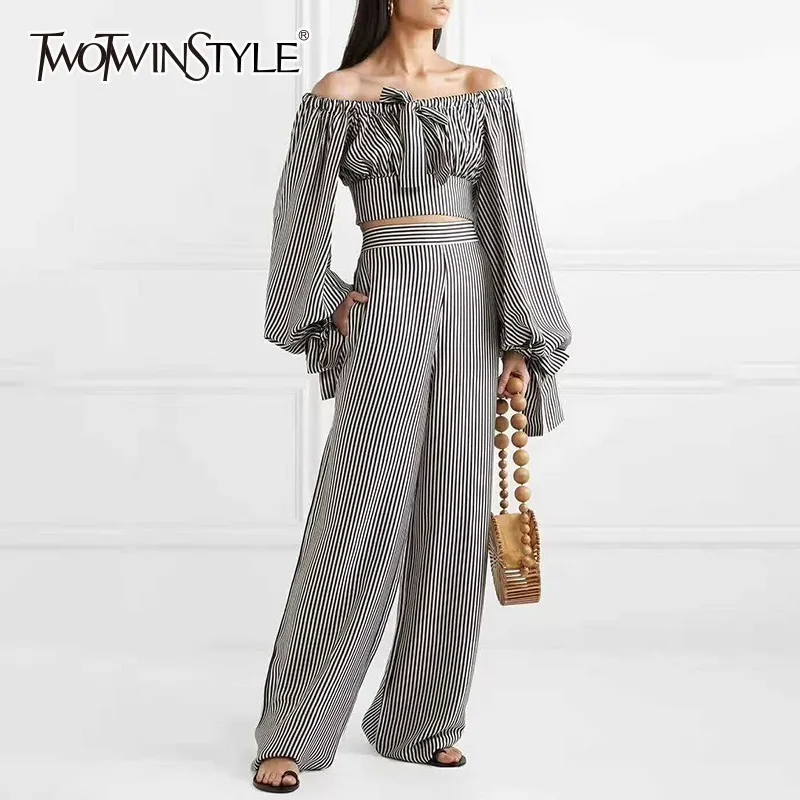 TWOTWINSTYLE Striped Two Piece Set Off Shoulder Lantern Long Sleeve Bowknot Crop Tops High Waist Wide Leg Pants 2019 Womens Suit
TWOTWINSTYLE Striped Two Piece Set Off Shoulder Lantern Long Sleeve Bowknot Crop Tops High Waist Wide Leg Pants 2019 Womens Suit