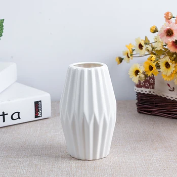 Nordic Stylish Small White Ceramic Vases European Fashion Ceramic Porcelain Flower Tabletop Vaso For flowers Home Decoration
Nordic Stylish Small White Ceramic Vases European Fashion Ceramic Porcelain Flower Tabletop Vaso For flowers Home Decoration