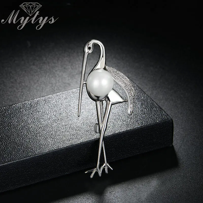 Mytys Fashion Elegant Pearl Crane with The Grace Brooches For Women Clothing Jewelry Accessory Gift For Girls Women X291
Mytys Fashion Elegant Pearl Crane with The Grace Brooches For Women Clothing Jewelry Accessory Gift For Girls Women X291