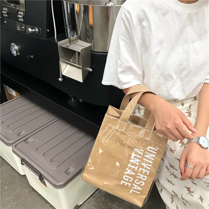 New Luxury Handbags Women Bags Designer Kraft Paper Shopping Bag Pvc Transparent Bag Women Handbag Bolsas Feminina Sac A Main
New Luxury Handbags Women Bags Designer Kraft Paper Shopping Bag Pvc Transparent Bag Women Handbag Bolsas Feminina Sac A Main
