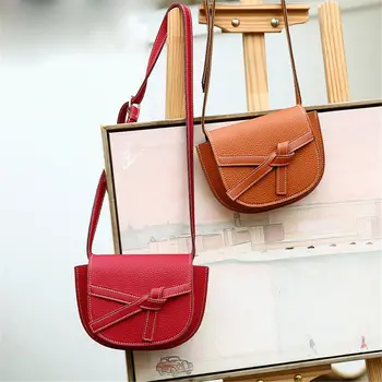 Women's fashion shoulder bag personality solid color bow bat bag Messenger bag
Women's fashion shoulder bag personality solid color bow bat bag Messenger bag