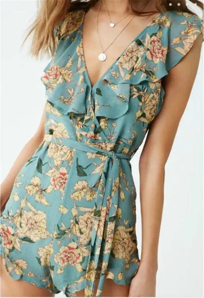 Uguest Sexy Women Jumpsuit Ruffles V-neck Short Sleeve Sashes Floral Printed Elegant Rompers For Woman Summer
Uguest Sexy Women Jumpsuit Ruffles V-neck Short Sleeve Sashes Floral Printed Elegant Rompers For Woman Summer