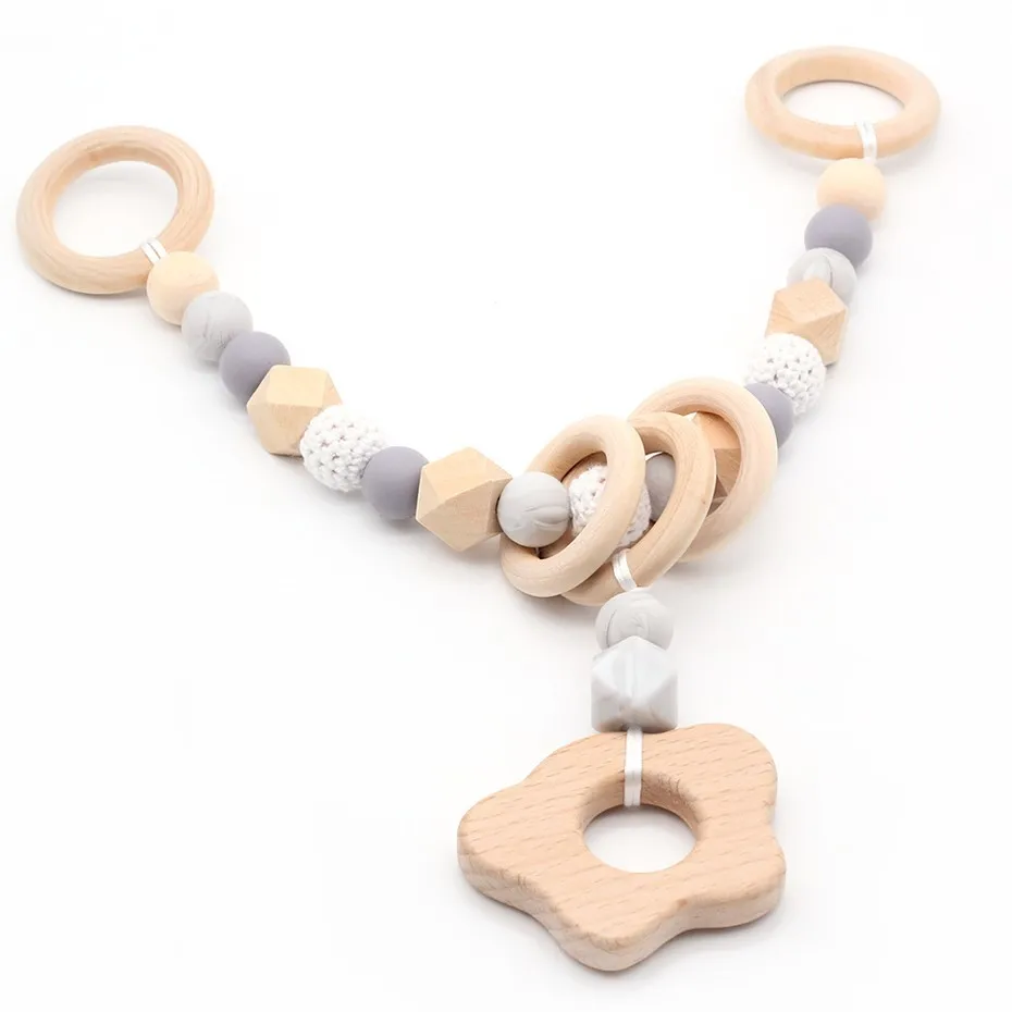 NEW Wooden Baby Rattle Teething Silicone Beads Bracelet Set Chew Toys Crochet Beads Pram Chain For Newborns Stroller Chains Toy
NEW Wooden Baby Rattle Teething Silicone Beads Bracelet Set Chew Toys Crochet Beads Pram Chain For Newborns Stroller Chains Toy