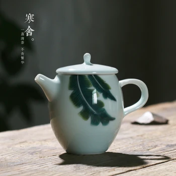 Chinese Kung Fu teapot celadon single pot pottery tea set hand painted banana leaf teapot household tea making filter kettle
Chinese Kung Fu teapot celadon single pot pottery tea set hand painted banana leaf teapot household tea making filter kettle