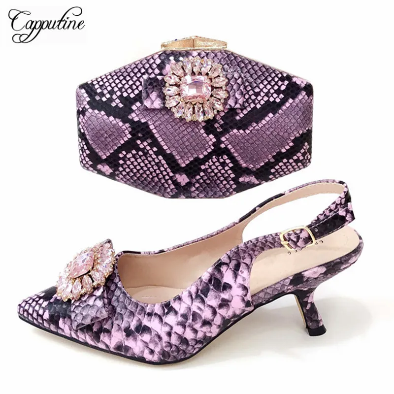Latest Summer Decorated With Crystal Woman Shoes And Bags Set African Style High Heel Shoes And Bags For Party Dress TX-891
Latest Summer Decorated With Crystal Woman Shoes And Bags Set African Style High Heel Shoes And Bags For Party Dress TX-891