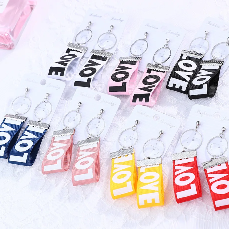 Personality Letter Love Cloth Ear Nail long Earrings Long Fund Temperament Woman Silk Ribbon Earring Product Eardrop
Personality Letter Love Cloth Ear Nail long Earrings Long Fund Temperament Woman Silk Ribbon Earring Product Eardrop