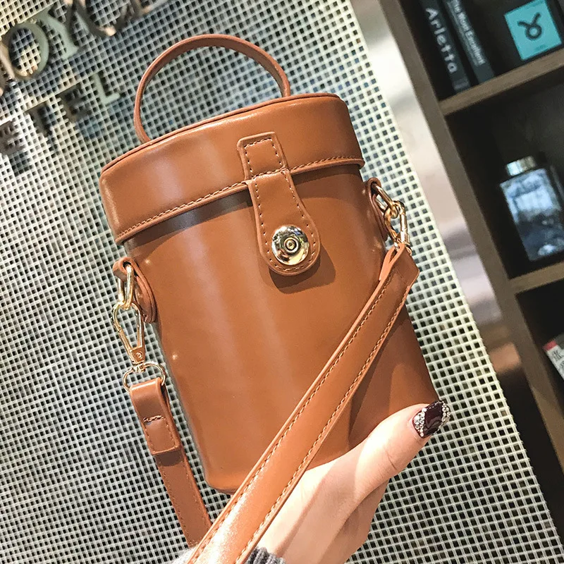 

PU Bucket Package Woman Hand Lock Catch Cylinder Packet Woman Single Shoulder Bag Individual Woman Handbag