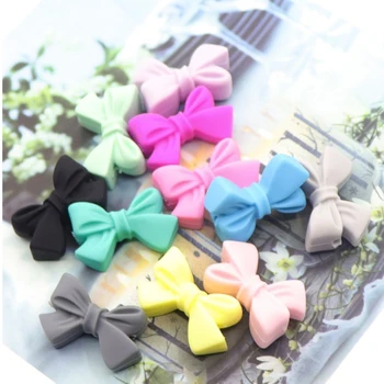 WKD 2019 Silicone Beads Bow Tie For Teething Holes Diy Beads 28mm Rosette Bpa Free Toy Accessories Baby Teether Beads 100pc
WKD 2019 Silicone Beads Bow Tie For Teething Holes Diy Beads 28mm Rosette Bpa Free Toy Accessories Baby Teether Beads 100pc