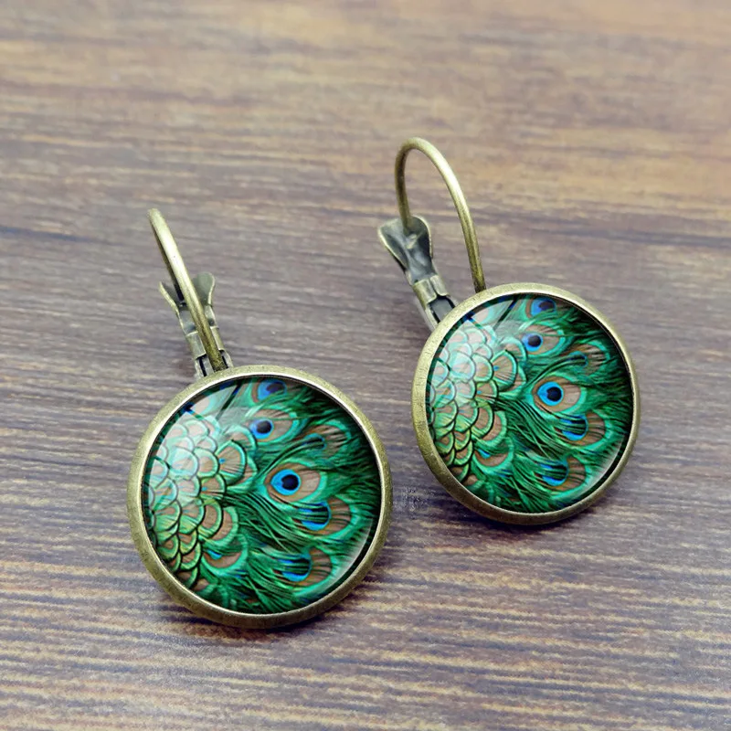 Vintage Bohemian Women Stud Earrings Retro Peacock Feathers Pattern Ethnic Round Toe Earrings Dangle Woman Earring 2019 Jewelry
Vintage Bohemian Women Stud Earrings Retro Peacock Feathers Pattern Ethnic Round Toe Earrings Dangle Woman Earring 2019 Jewelry