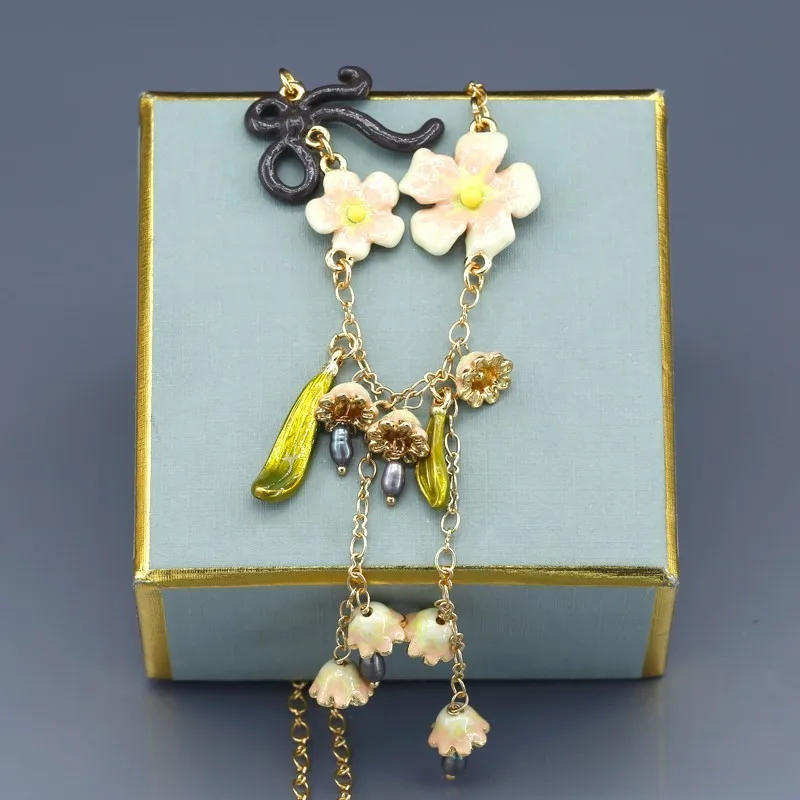 Enamel Glaze Pink Colour Lily Of The Valley FLOWER Bow Tassels Many Fall Small Bell Clavicle Necklace Woman
Enamel Glaze Pink Colour Lily Of The Valley FLOWER Bow Tassels Many Fall Small Bell Clavicle Necklace Woman
