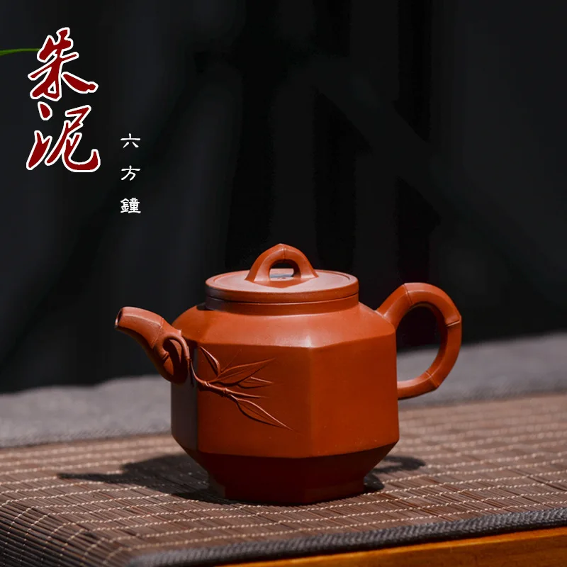 Zhu Sha Square Kettle Dark-red Enameled Pottery Teapot Six Square Palace Lantern Bamboo Leaf Manual Teapot Senior Engineer
Zhu Sha Square Kettle Dark-red Enameled Pottery Teapot Six Square Palace Lantern Bamboo Leaf Manual Teapot Senior Engineer