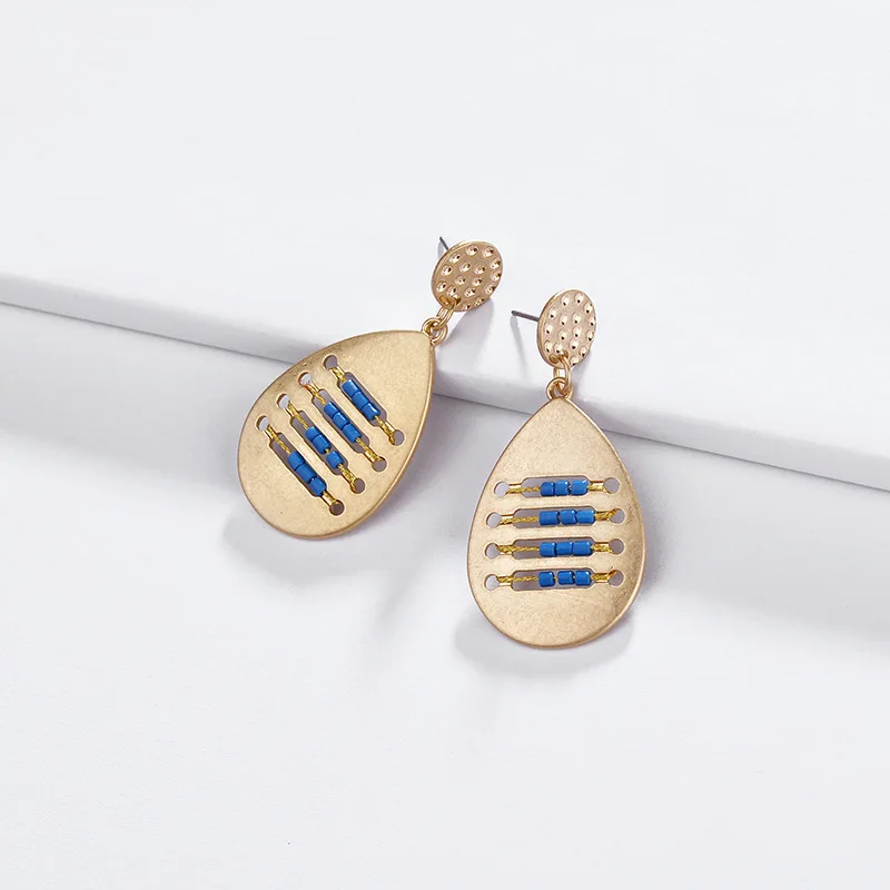 Waterdrop Metal Teardrop Earrings Geometric Hollow Drop Acrylic Bead Woven for Women Fashion Jewelry Statement Earrings NEW-2019
Waterdrop Metal Teardrop Earrings Geometric Hollow Drop Acrylic Bead Woven for Women Fashion Jewelry Statement Earrings NEW-2019