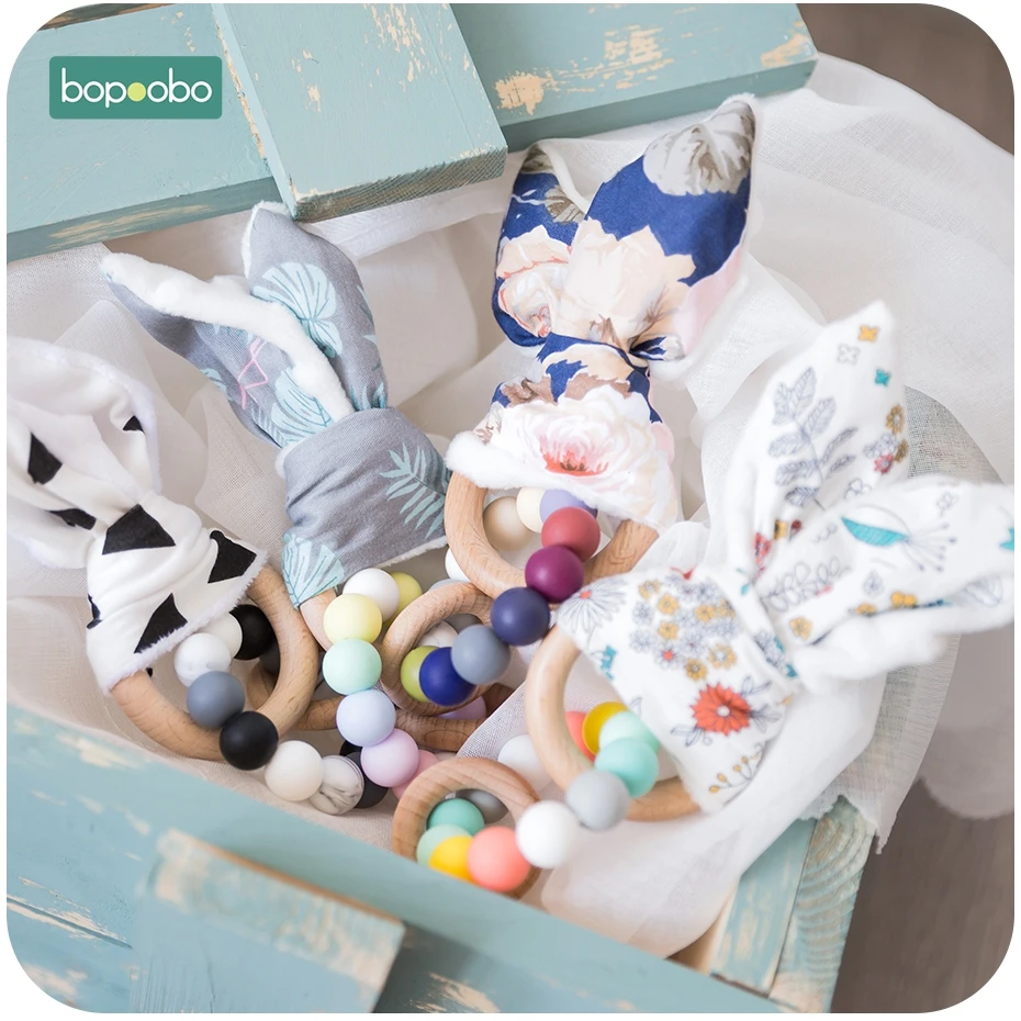 Bopoobo Musical Baby rattles New Born Baby Toys Rattles For Kids To A Year Wooden Tings Teether Silicone Tiny Rod Silicon Beads
Bopoobo Musical Baby rattles New Born Baby Toys Rattles For Kids To A Year Wooden Tings Teether Silicone Tiny Rod Silicon Beads