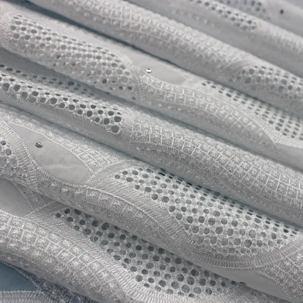White Dress Fabric High Quality African Swiss Voile Lace New Design White Fabric Cotton Lace With Stones African Guipure Lace
White Dress Fabric High Quality African Swiss Voile Lace New Design White Fabric Cotton Lace With Stones African Guipure Lace