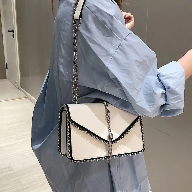Designer Bags Famous Brand Women Bags 2019 European Fashion Small Tassel Purses And Handbag Chain Rivet Crossbody Bags For Women
Designer Bags Famous Brand Women Bags 2019 European Fashion Small Tassel Purses And Handbag Chain Rivet Crossbody Bags For Women