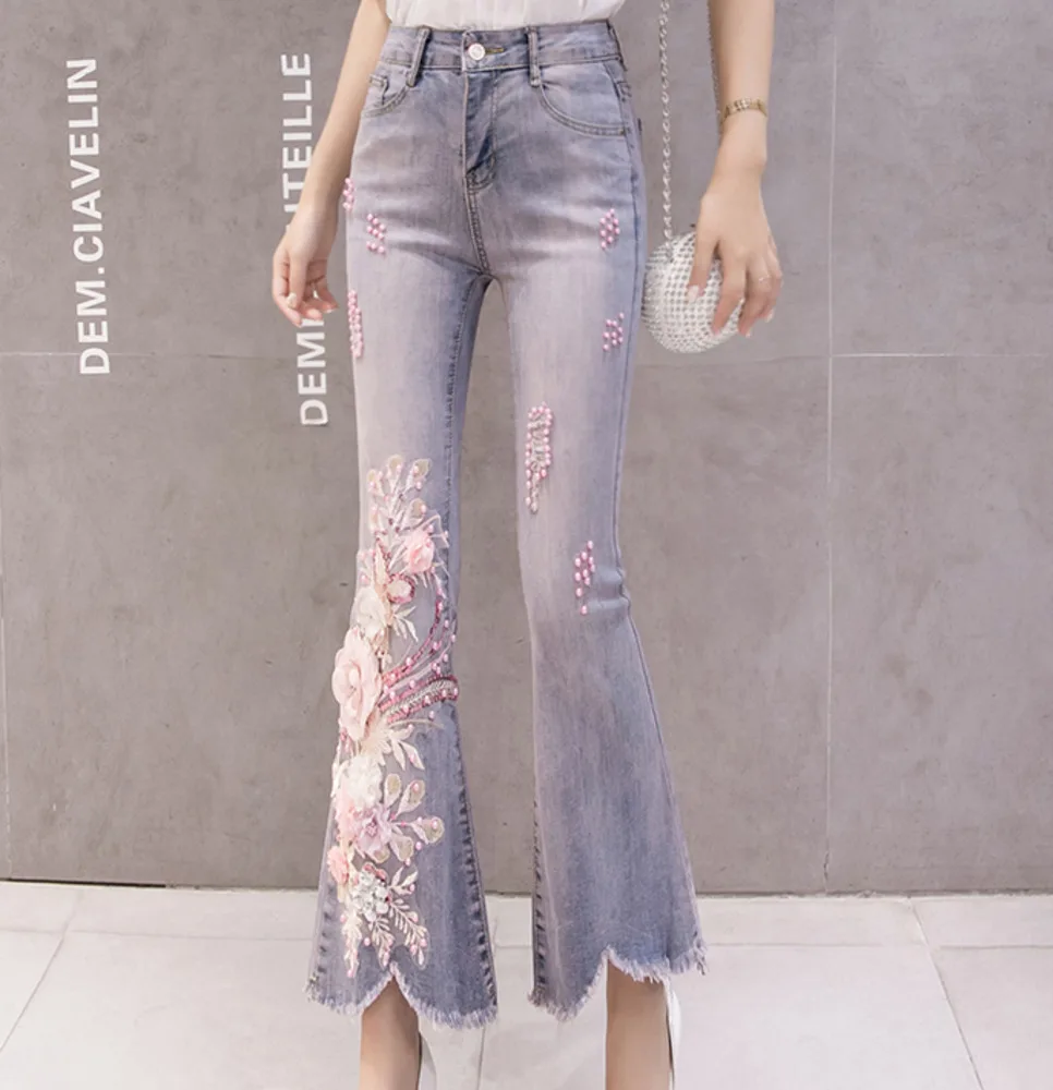 High Waist Elastic Jeans Women 3D Flower Embroidery Appliques Pearls Denim Long Trousers Ladies Flare Pants Sequined Casual Jean
High Waist Elastic Jeans Women 3D Flower Embroidery Appliques Pearls Denim Long Trousers Ladies Flare Pants Sequined Casual Jean