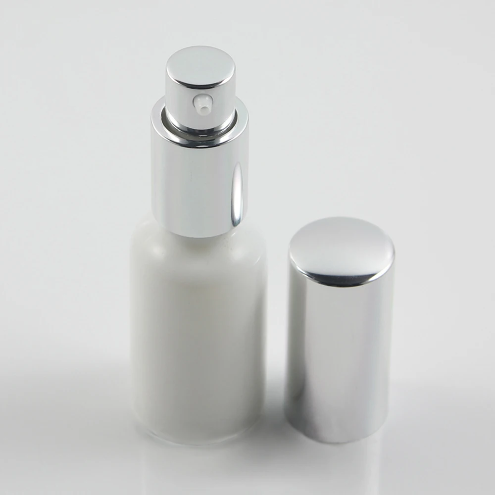 High quality 20ml white glass bottle with silver pump cosmetic packaging bottle
High quality 20ml white glass bottle with silver pump cosmetic packaging bottle