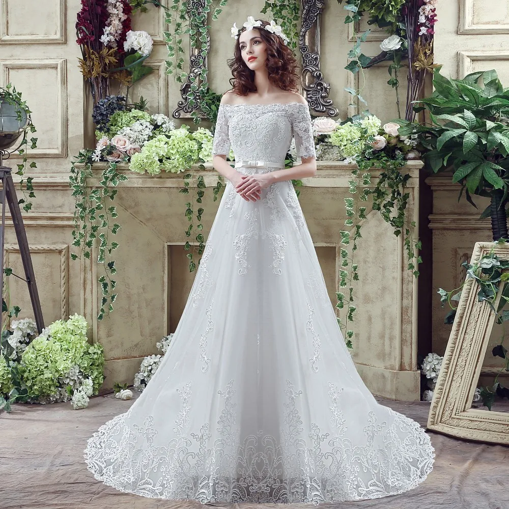 Vivian's Bridal 2018 Off Shoulder Short Sleeve Wedding Dress Lace Appliques Sashes Back Lace-up A-line Sweep Train Bridal Dress 
Vivian's Bridal 2018 Off Shoulder Short Sleeve Wedding Dress Lace Appliques Sashes Back Lace-up A-line Sweep Train Bridal Dress