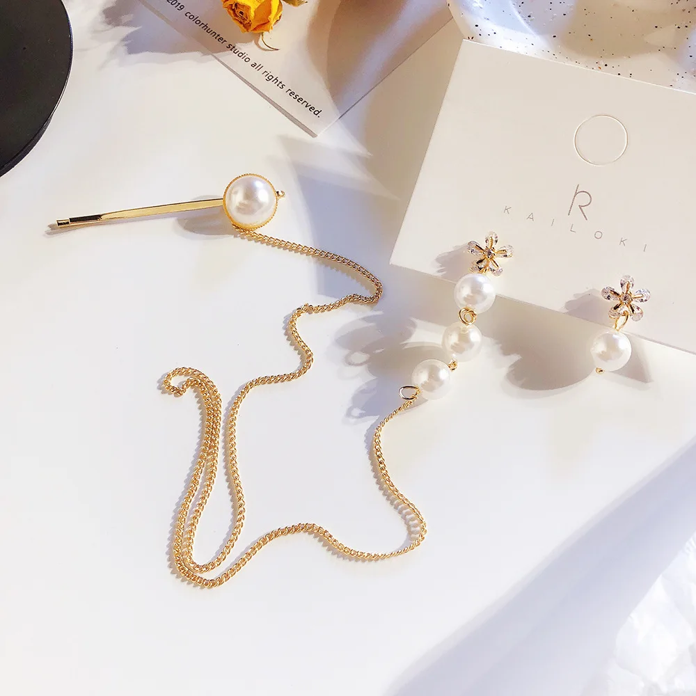 2019 Korean fashion flowers pearl asymmetric earrings personalized one-piece pearl hairpin connection earrings party jewelry 
2019 Korean fashion flowers pearl asymmetric earrings personalized one-piece pearl hairpin connection earrings party jewelry