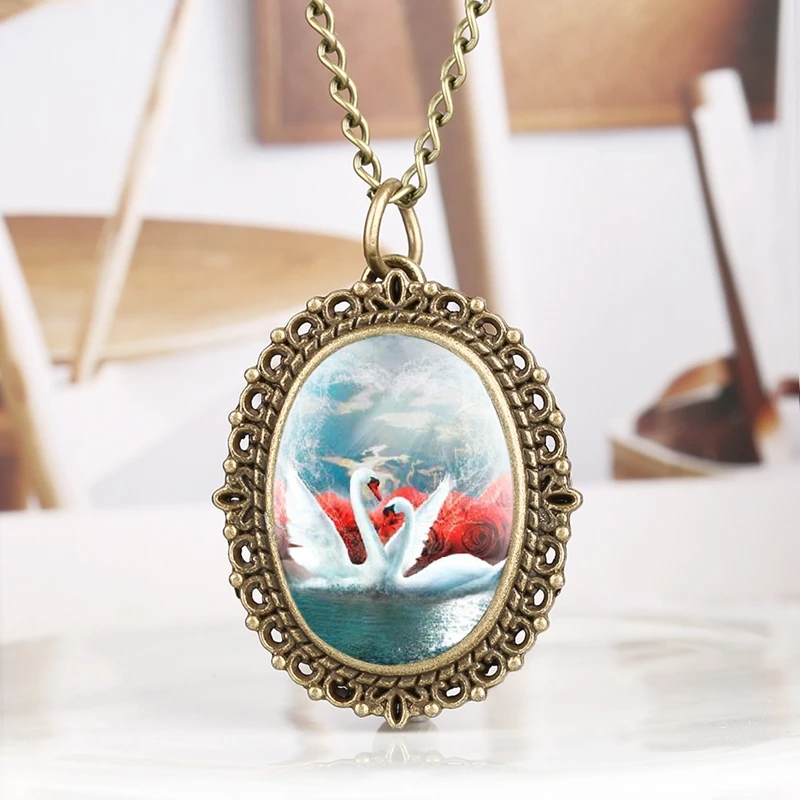 Oval Double Swans Display Quartz Pocket Watch New Fashion Retro Necklace Sweater Chain Pendant Clock Timepiece Gift Collectibles
Oval Double Swans Display Quartz Pocket Watch New Fashion Retro Necklace Sweater Chain Pendant Clock Timepiece Gift Collectibles