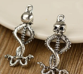 30pcs Exquisite skull snake charms 38*20*9mm pendants Antique silver bag Handmade earring bracelet necklace anklet Component DIY
30pcs Exquisite skull snake charms 38*20*9mm pendants Antique silver bag Handmade earring bracelet necklace anklet Component DIY