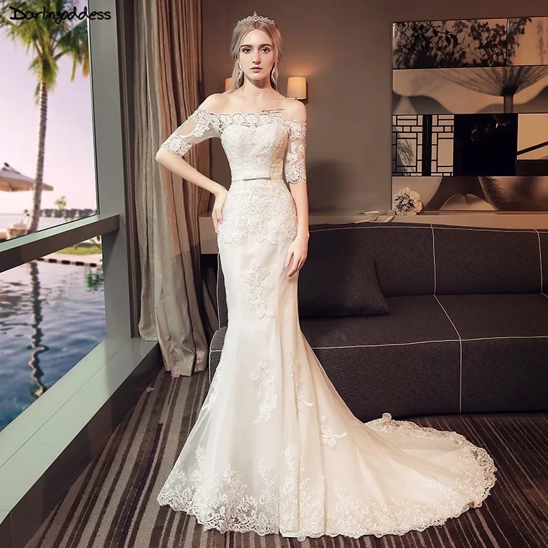 Sexy Off Shoulder Mermaid Wedding Dress Ivory Lace Half Sleeve Mermaid Wedding Gown Boat Neck Bridal Dress 2019 Vestido De Noiva 
Sexy Off Shoulder Mermaid Wedding Dress Ivory Lace Half Sleeve Mermaid Wedding Gown Boat Neck Bridal Dress 2019 Vestido De Noiva