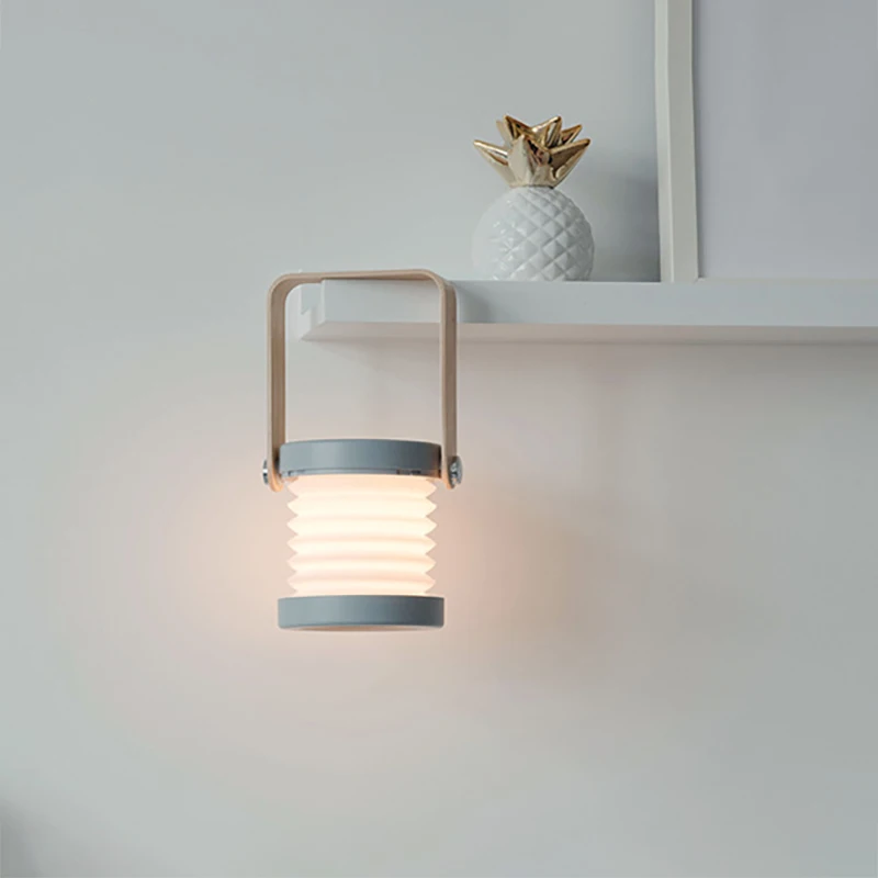 Creative wooden handle portable lantern lamp telescopic folding led table lamp usb charging night light reading lamp
Creative wooden handle portable lantern lamp telescopic folding led table lamp usb charging night light reading lamp
