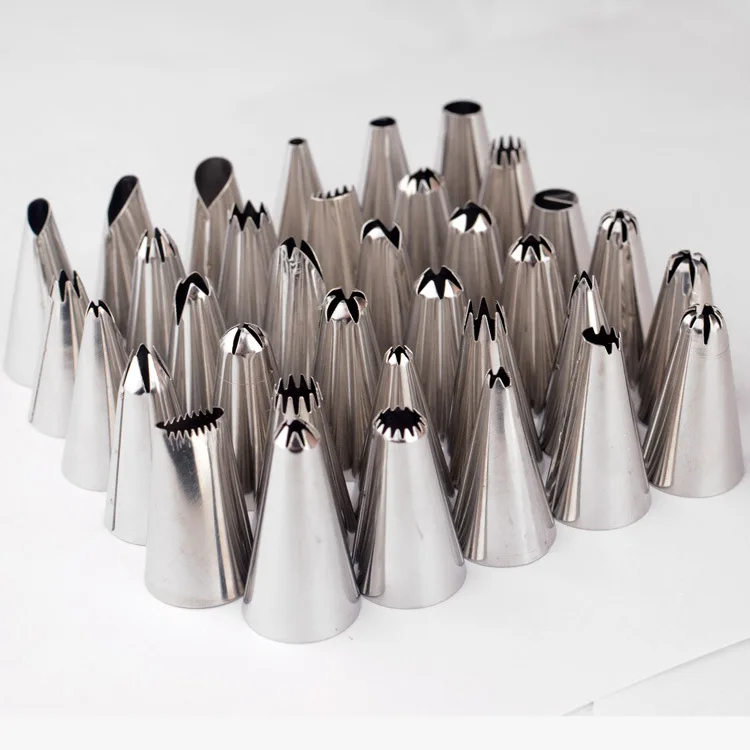New Qualified Cake Decorating 24Pcs/set Large Stainless steel Icing Piping Nozzles Pastry Tips Set Kitchen Accessories
New Qualified Cake Decorating 24Pcs/set Large Stainless steel Icing Piping Nozzles Pastry Tips Set Kitchen Accessories