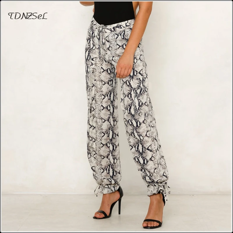 Casual Women Snake Print Loose Lantern Pants Lace Up Leggings Drawstring High Waist Harem Trousers Hippie Comfy Streetwear 2019
Casual Women Snake Print Loose Lantern Pants Lace Up Leggings Drawstring High Waist Harem Trousers Hippie Comfy Streetwear 2019