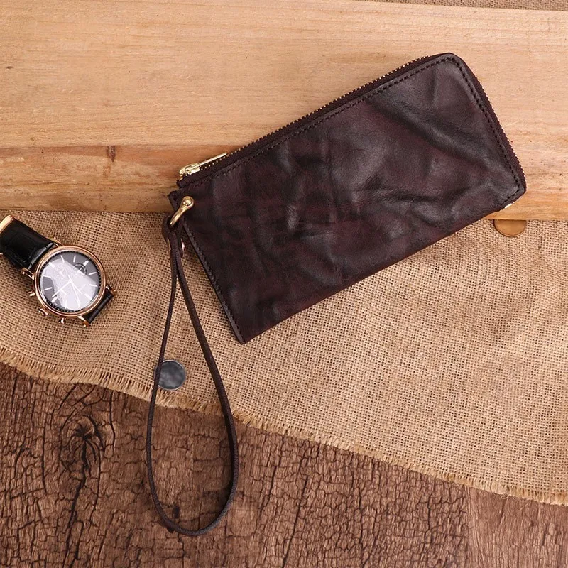 2019 New men wallet Top Quality retro style personality handmade zipper Handbag coin purse vegetable tanned leather Money Bag
2019 New men wallet Top Quality retro style personality handmade zipper Handbag coin purse vegetable tanned leather Money Bag