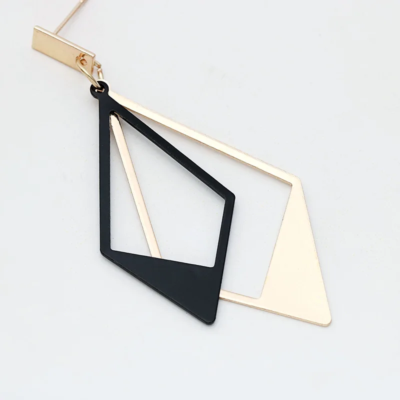 Creative in Europe And America Fashion New Style Black And White Diamond Earrings Exaggerated Geometric Double Ms Triangle Earri
Creative in Europe And America Fashion New Style Black And White Diamond Earrings Exaggerated Geometric Double Ms Triangle Earri