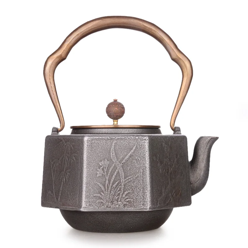 Japanese handmade crude cast iron octagonal tea pot uncoated iron bottle water kettle teapot copper cover and handle 1.2L
Japanese handmade crude cast iron octagonal tea pot uncoated iron bottle water kettle teapot copper cover and handle 1.2L