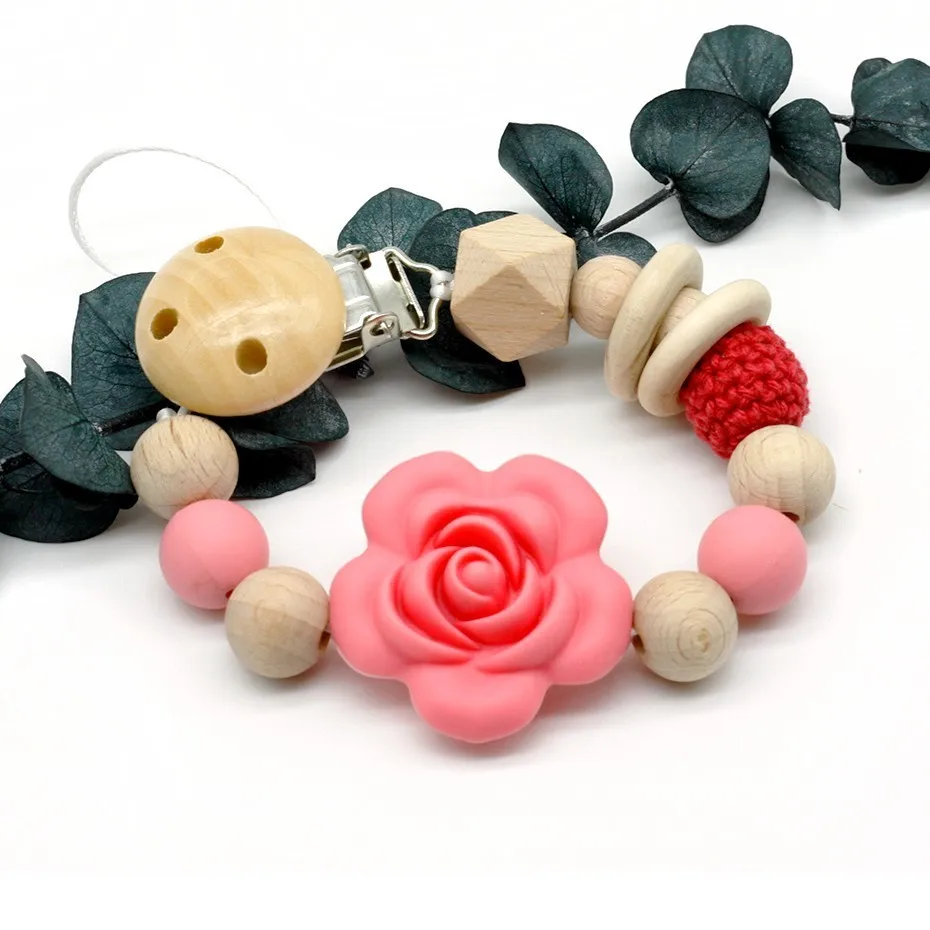 Silicone Flower Natural Wooden Beads 5 Color Baby Pacifiers Hold Some Toys Silicone Chews Teeth Bracket Accessories Newborn Gift
Silicone Flower Natural Wooden Beads 5 Color Baby Pacifiers Hold Some Toys Silicone Chews Teeth Bracket Accessories Newborn Gift