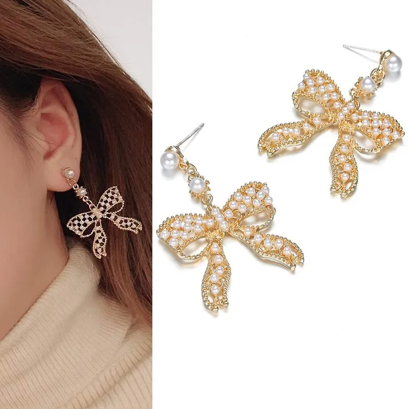 Korean Earrings for Women Brincos Fashion Gold Bowknot Simulated Pearl Earring Female Bohemian Drop Earrings 2019 Jewelry
Korean Earrings for Women Brincos Fashion Gold Bowknot Simulated Pearl Earring Female Bohemian Drop Earrings 2019 Jewelry