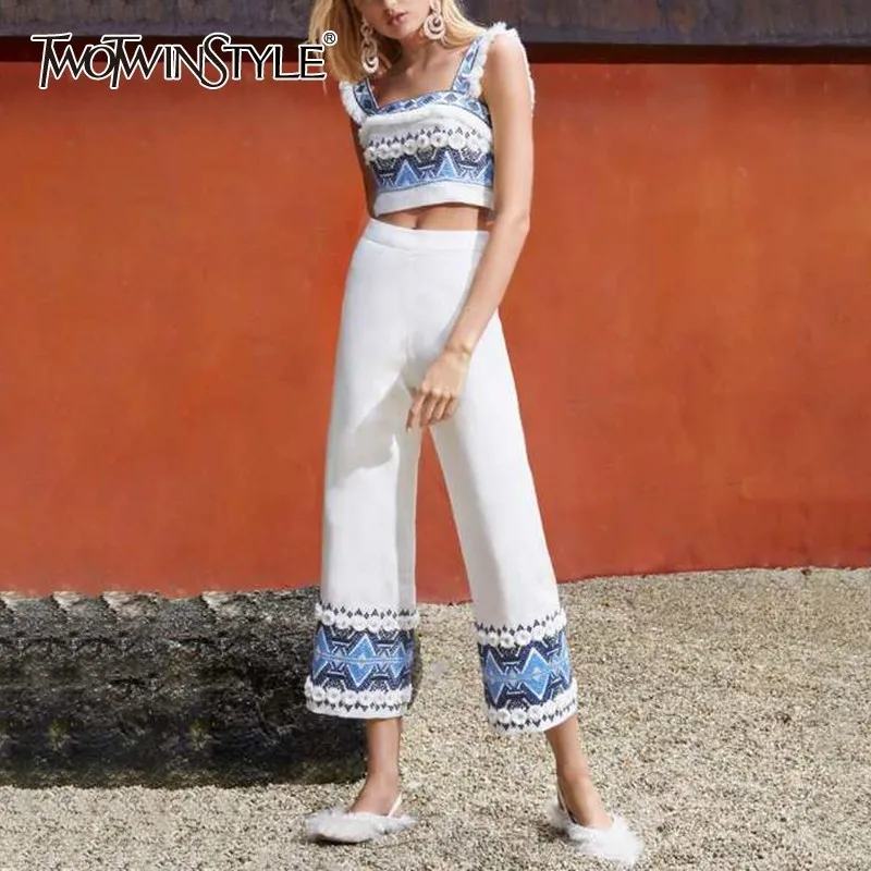 TWOTWINSTYLE Off Shoulder Embroidery Women Two Piece Set Strap Short Tops Loose Wide Leg Pants Print Suit Female Fashion 2019
TWOTWINSTYLE Off Shoulder Embroidery Women Two Piece Set Strap Short Tops Loose Wide Leg Pants Print Suit Female Fashion 2019