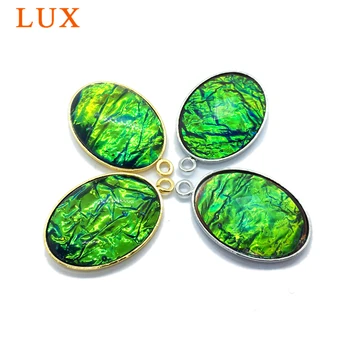 silvers gold color plated lab created Canadian Ammolite Pendant green oval connector for making necklace/earring/bracelet
silvers gold color plated lab created Canadian Ammolite Pendant green oval connector for making necklace/earring/bracelet