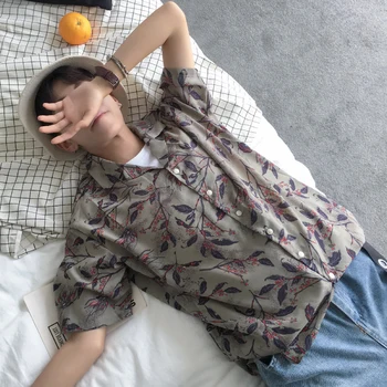 Summer loose short-sleeved men's shirt Korean version of the floral suit collar shirt trend retro Hawaiian wind beach jacket
Summer loose short-sleeved men's shirt Korean version of the floral suit collar shirt trend retro Hawaiian wind beach jacket