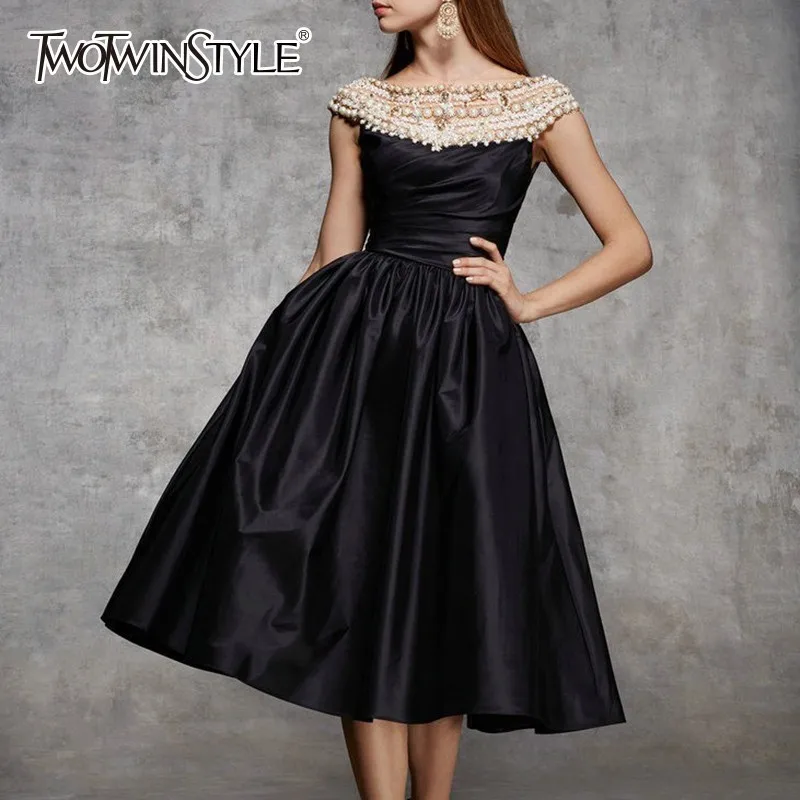 TWOTWINSTYLE Satin Evening Party Dress For Women Sleeveless High Waist Pearl Crystals Midi Ball Gown Dresses Female 2019 Autumn
TWOTWINSTYLE Satin Evening Party Dress For Women Sleeveless High Waist Pearl Crystals Midi Ball Gown Dresses Female 2019 Autumn