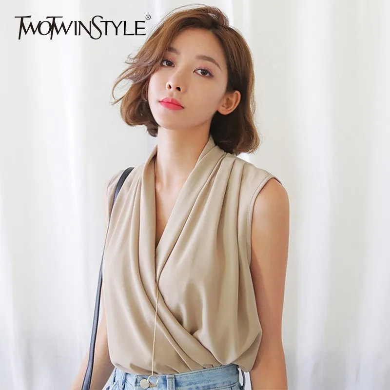 TWOTWINSTYLE Elegant Off Shoulder Shirts For Women V Neck Sleeveless Blouse Tops Female Ladies OL Fashion 2019 Summer New
TWOTWINSTYLE Elegant Off Shoulder Shirts For Women V Neck Sleeveless Blouse Tops Female Ladies OL Fashion 2019 Summer New
