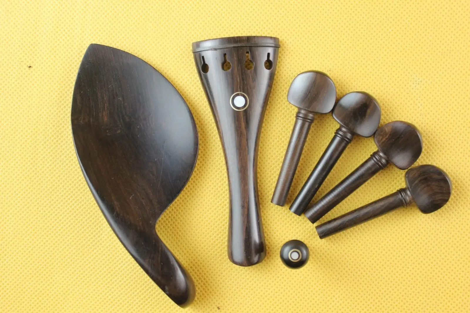 

1 set new undyed ebony violin parts 4/4, pegs, tailpiece, chinrest, endpin