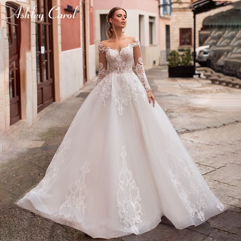 Ashley Carol Illusion Wedding Dress Custom Sexy V-neck Long Sleeve Backless A-Line Bride Dresses Vestido De Noiva Wedding Gowns
Ashley Carol Illusion Wedding Dress Custom Sexy V-neck Long Sleeve Backless A-Line Bride Dresses Vestido De Noiva Wedding Gowns