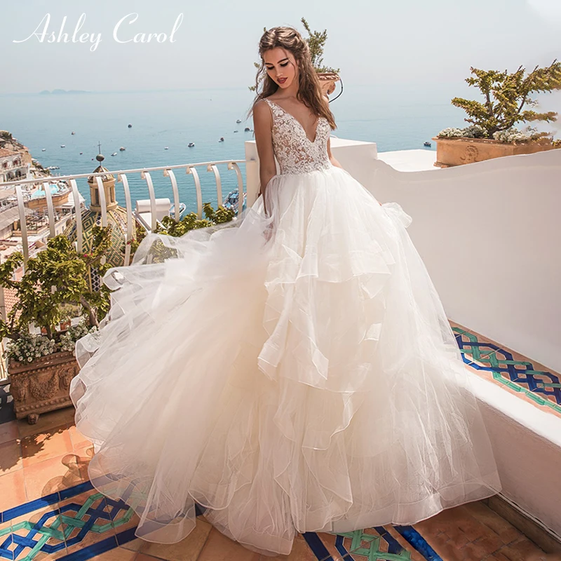 Ashley Carol Wedding Dress 2019 Sexy Deep V-neckline Sleeveless Backless abiye Princess Bride Gown Robe De Soiree Customized
Ashley Carol Wedding Dress 2019 Sexy Deep V-neckline Sleeveless Backless abiye Princess Bride Gown Robe De Soiree Customized