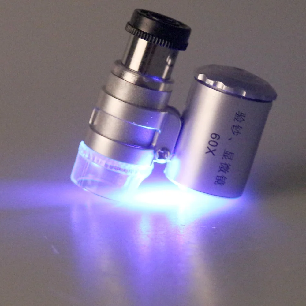 New Mini 60X Microscope LED Jewellery Loupe UV Currency Detector Portable Magnifier Magnifying Glass Eye Lens with LED Light 1Pc
New Mini 60X Microscope LED Jewellery Loupe UV Currency Detector Portable Magnifier Magnifying Glass Eye Lens with LED Light 1Pc
