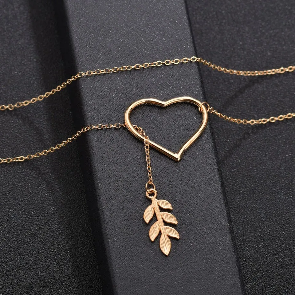 Women Fashion Pendant Necklace Gold Hallow Heart Lucky Leaf Through The Heart Wedding Jewelry Cute Romantic Female Jewelry
Women Fashion Pendant Necklace Gold Hallow Heart Lucky Leaf Through The Heart Wedding Jewelry Cute Romantic Female Jewelry