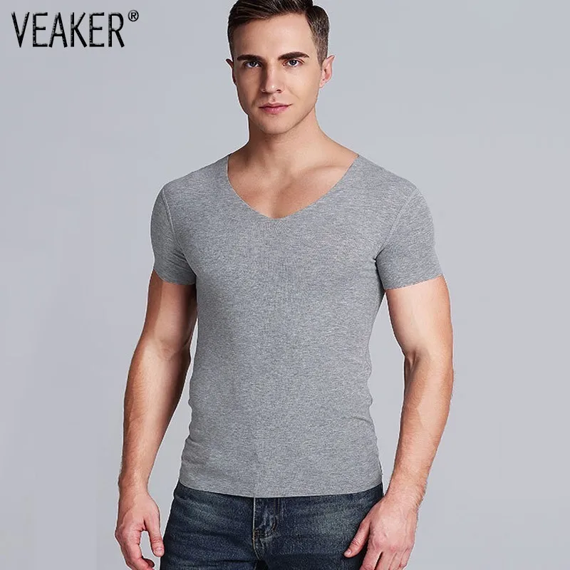 2019 New Men's Seamless V Neck T shirt Male Slim Fit Breathable Modal Short Sleeve T Shirts Men Fitness Gyms Tshirt Tops
2019 New Men's Seamless V Neck T shirt Male Slim Fit Breathable Modal Short Sleeve T Shirts Men Fitness Gyms Tshirt Tops