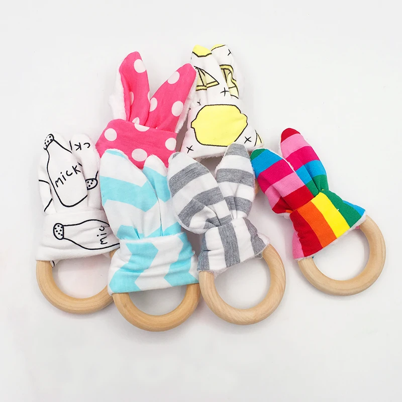 Cute Baby Girls Boys Bunny Ear Teether Kid Safe Natural Wooden Ring Bracelet Toddle Teething Chew Toys Shower Gift for Baby Care
Cute Baby Girls Boys Bunny Ear Teether Kid Safe Natural Wooden Ring Bracelet Toddle Teething Chew Toys Shower Gift for Baby Care