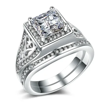 Huitan Classic 2PC Wedding Band Ring Set with Princess Cut Cubic Zirconia Prong Setting Silver Plated Eternity Rings for Women
Huitan Classic 2PC Wedding Band Ring Set with Princess Cut Cubic Zirconia Prong Setting Silver Plated Eternity Rings for Women
