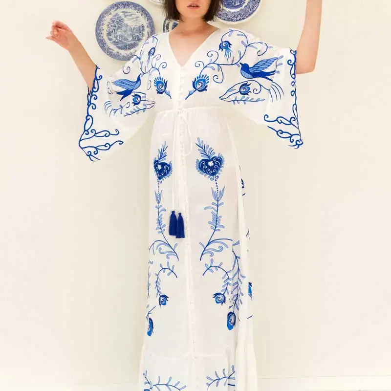 BOHO INSPIRED floral bireds embroidered maxi dress V-neck batwing sleeve tunic summer beach dress for women tassle tied buttos
BOHO INSPIRED floral bireds embroidered maxi dress V-neck batwing sleeve tunic summer beach dress for women tassle tied buttos