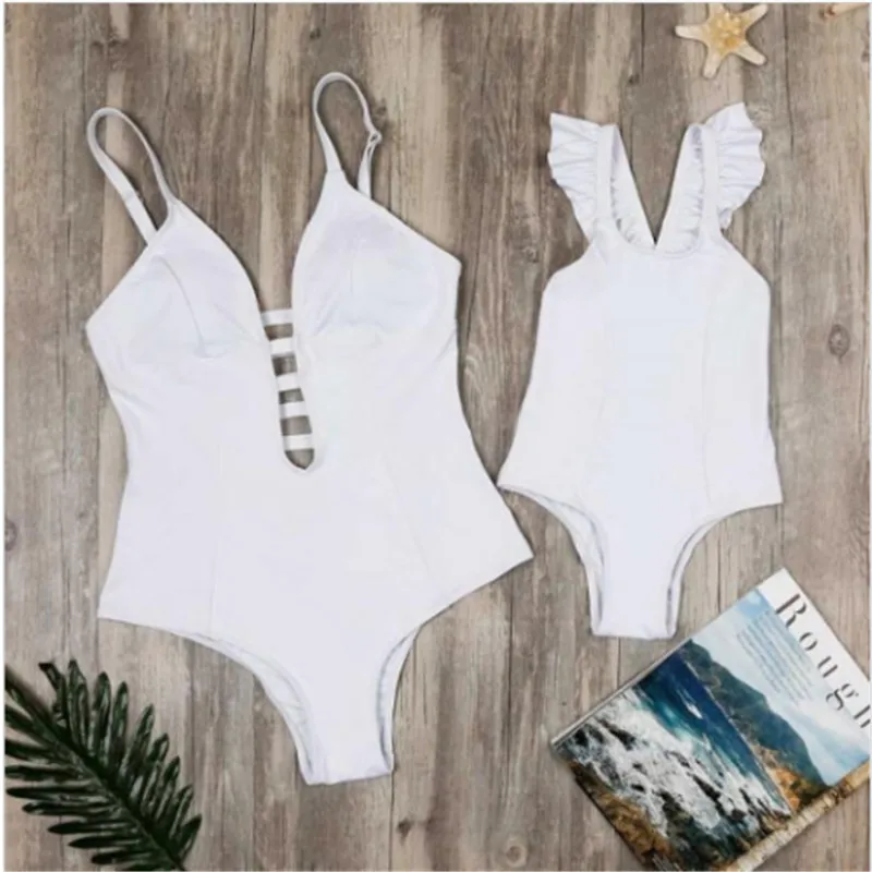 Family Matching Swimsuit Bikini Set Hollow Out Ruffles Criss-cross Mother Daughter Swimwear One Piece Beachwear Bathing Suit New
Family Matching Swimsuit Bikini Set Hollow Out Ruffles Criss-cross Mother Daughter Swimwear One Piece Beachwear Bathing Suit New